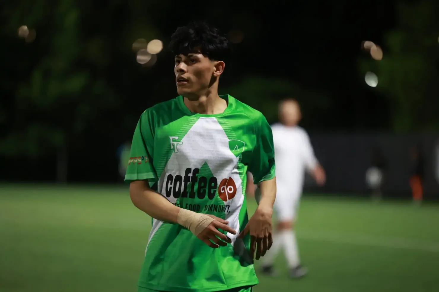 Alloy player driving forward on the ball