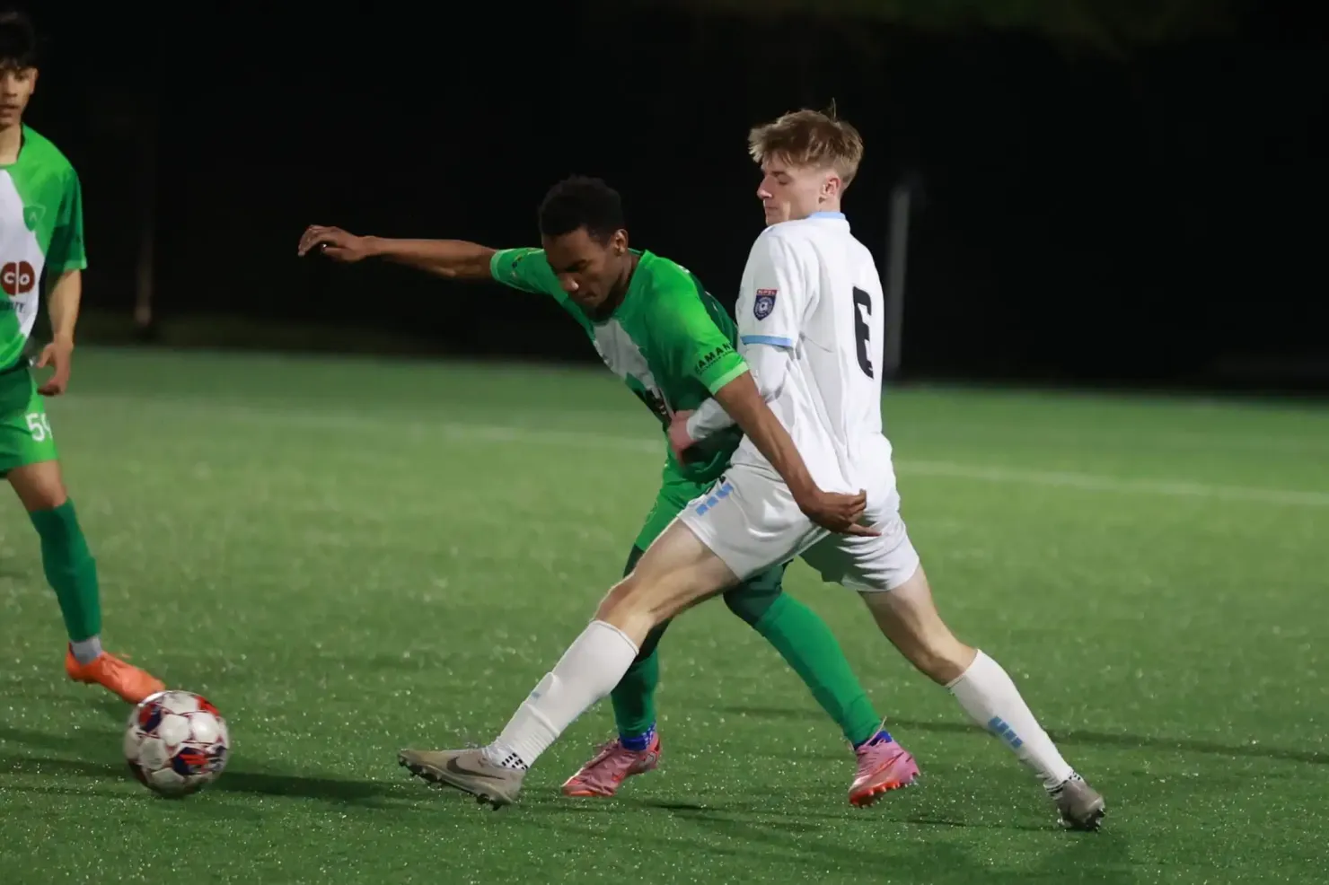 Alloy player shielding the ball in a duel